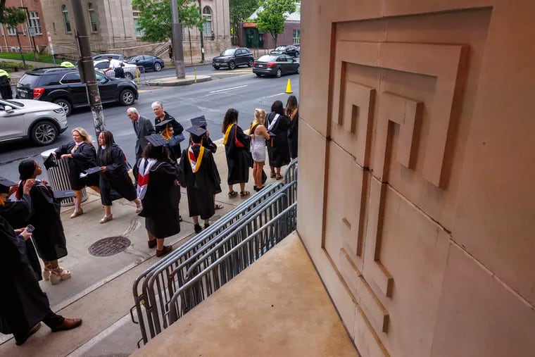 Graduates lined up outside the Liacouras Center for the 137th commencement at Temple University on May 8.