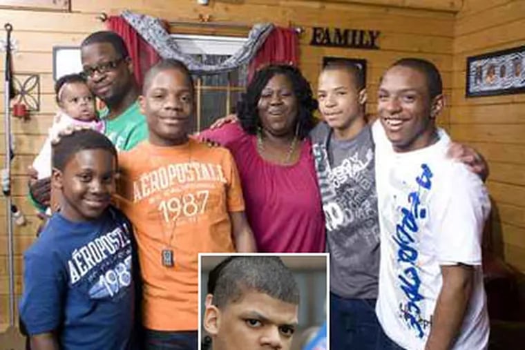 Seven years after four starving Collingswood brothers made headlines, three are with the Parrish family: (from left) C.J., 10; father James, with granddaughter; adoptees Terrell, Michael, and TreShawn.  None have contact with Bruce (inset).