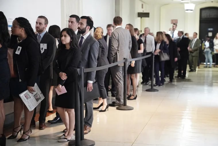 A long line of people waited outside the state Supreme Court courtroom in Philadelphia City Hall on Wednesday morning, Sept. 11, 2019, to hear arguments over the constitutionality of the death penalty in the state.