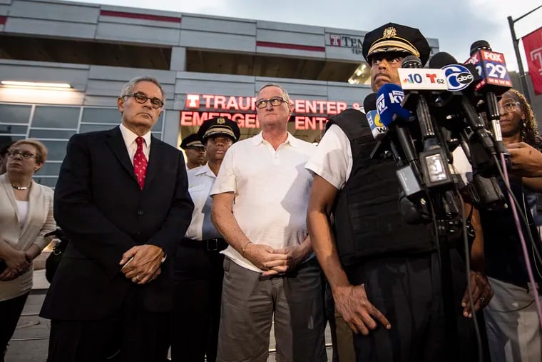 Philadelphia Police Commissioner Richard Ross speaks to reporters at Temple University Hospital after six cops were shot in Tioga on Wednesday, Aug. 14, 2019. With him are District Attorney Larry Krasner, left, and Mayor Jim Kenney.