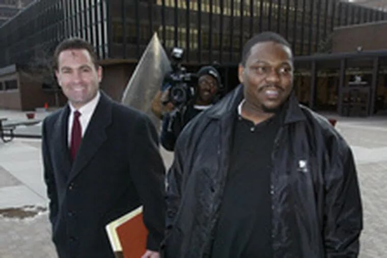 Beanie Sigel (right) leaves federal courthouse yesterday with attorney Fortunato Perri Jr. after probation violation hearing.