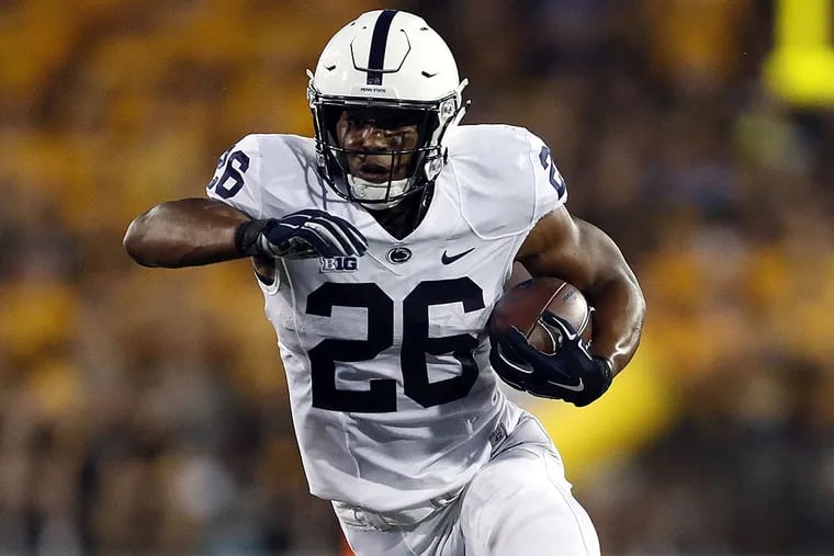 Penn State running back Saquon Barkley runs with the ball during the first half of an NCAA college football game against Iowa Saturday, Sept. 23, 2017, in Iowa City, Iowa.