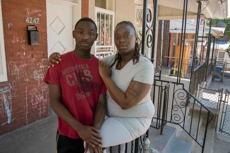 Eugene Lee, 16, at home in Frankford with his mother, Wylicia Clark, spent three months in jail
for an attempted robbery with a BB gun — which he was not wielding.