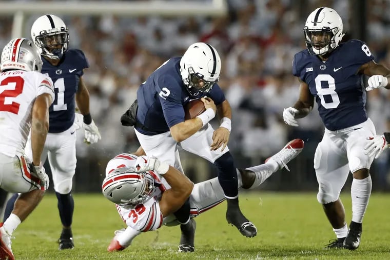 Penn State's Tommy Stevens (2), getting brought down by Ohio State's Malik Harrison (39) during the first half Sept. 29, has been on the field for only four plays this season.