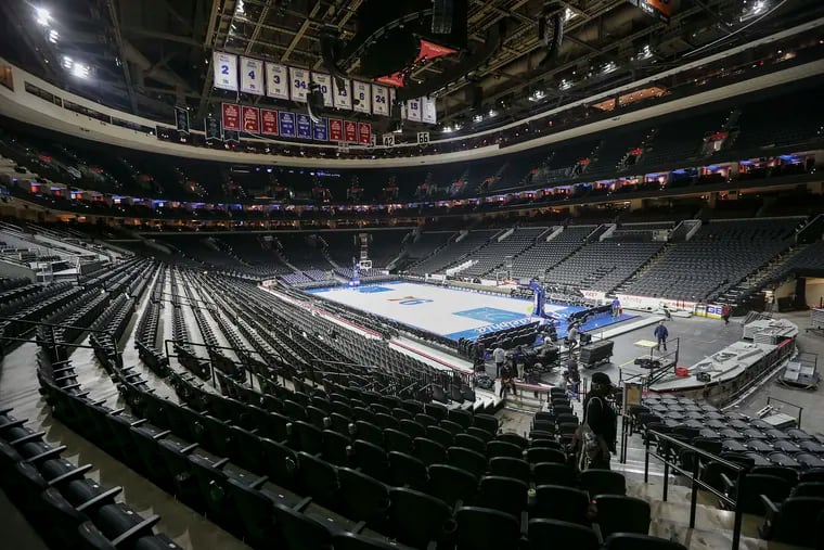 The Wells Fargo Center sits empty after the Sixers-Pistons game on Wednesday. The NBA suspended its season after games that day.