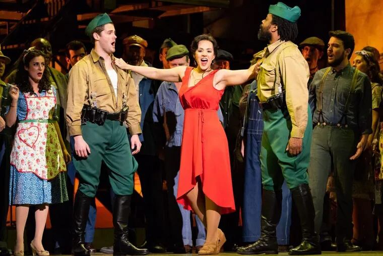 Carmen (mezzo soprano Daniela Mack) sings to the soldiers in Opera Philadelphia’s production of Bizet’s “Carmen.”