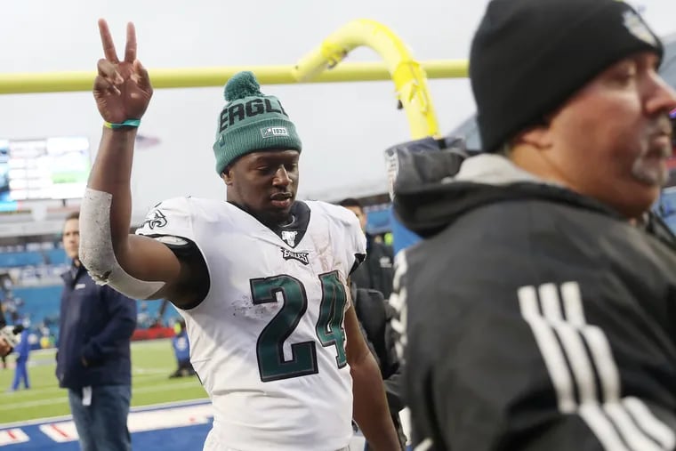 Eagles running back Jordan Howard (24) gestured to fans as he left the field after a game against the Buffalo Bills in 2019.