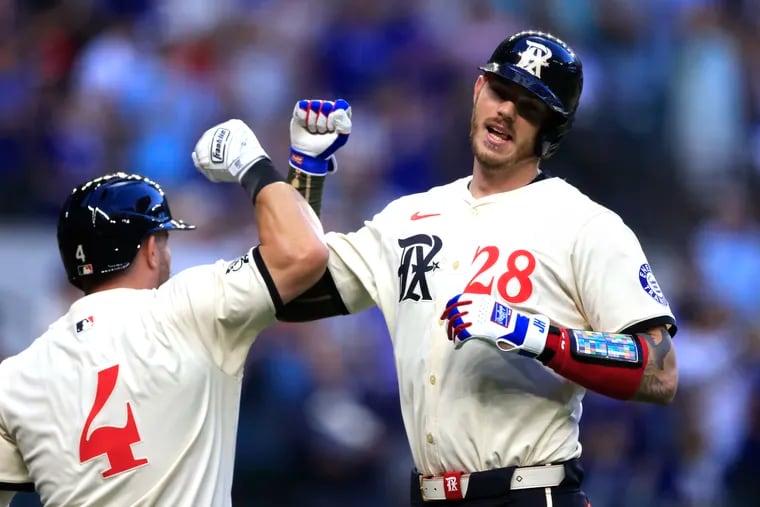 Jonah Heim #28 of the Texas Rangers celebrates after hitting a solo home run against the Los Angeles Angels during the second inning at Globe Life Field on May 17, 2024 in Arlington, Texas. (Photo by Ron Jenkins/Getty Images)
