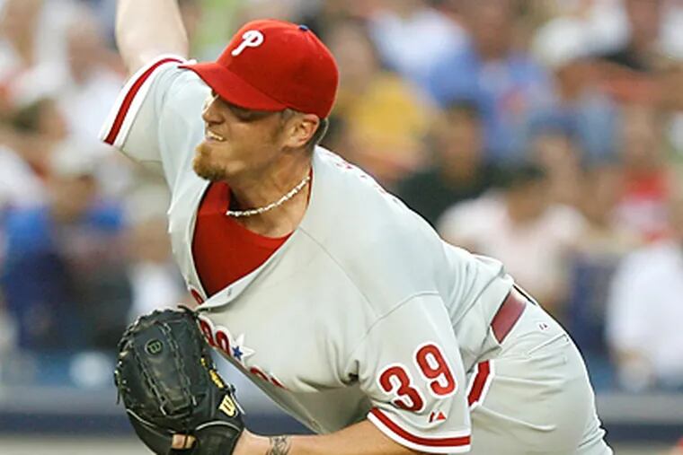 Brett Myers gave up three earned runs, three hits and five walks in his return to the Phillies - including four straight walks in the bottom of the first inning. (Seth Wenig/AP)