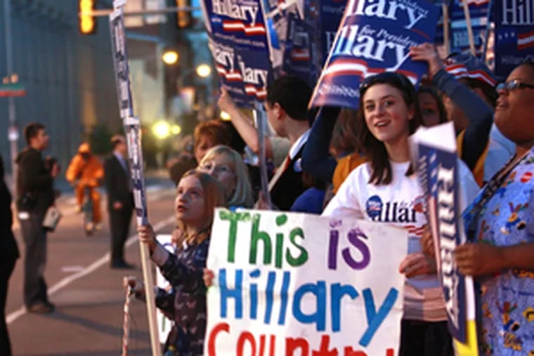 Supporters gather outside the National Constitution Center as senators Barack Obama and Hillary Clinton debate yesterday.