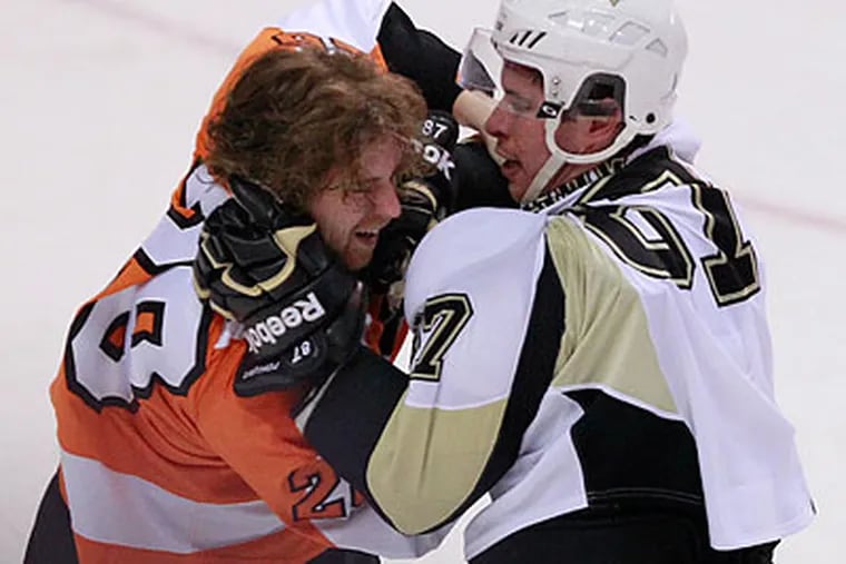 Claude Giroux and Sidney Crosby both have histories of suffering concussions. (Ron Cortes/Staff Photographer)