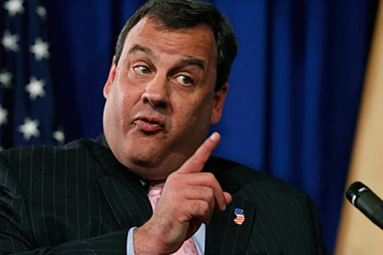 &quot;The whole system is not working as it was intended to work,&quot; Gov. Christie said of the greenhouse-gas initiative in his announcement with Bob Martin, N.J. commissioner of Environmental Protection. Environmentalists disagreed with the move and said it would cost state jobs. (Mel Evans / Associated Press)