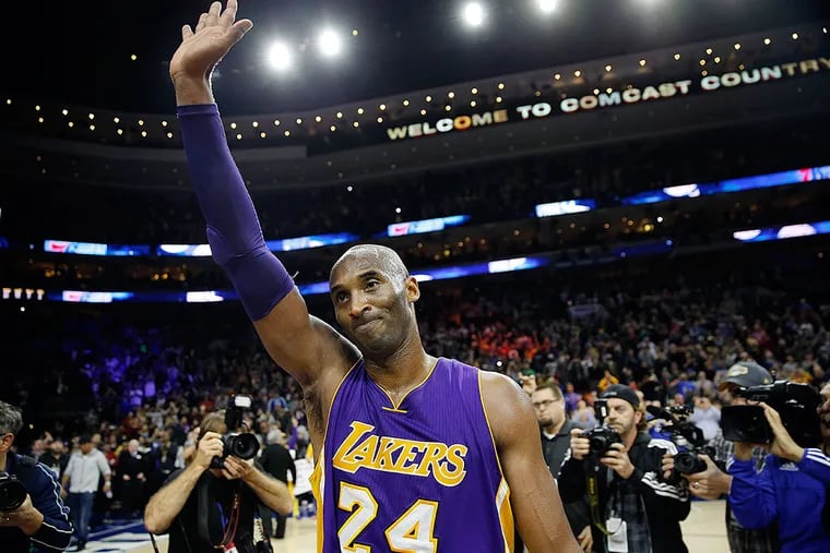 Los Angeles Lakers' Kobe Bryant waves to the crowd after an NBA
basketball game against the Philadelphia 76ers, Tuesday, Dec. 1, 2015,
in Philadelphia. Philadelphia won 103-91.