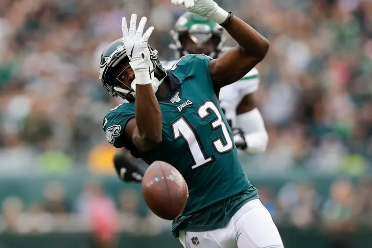 Eagles wide receiver Nelson Agholor can't come up with a pass against the  Jets.