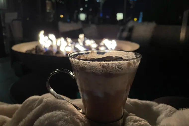 Cozy up with furry blankets, fire and hot cocktails atop Assembly Rooftop.