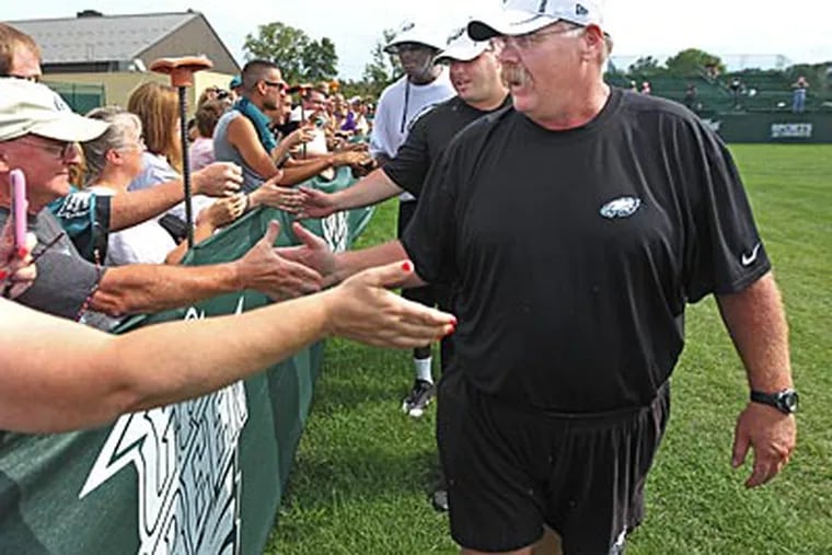 Eagles head coach Andy Reid greets fans during Fan Appreciation Day in Lehigh. (Michael Bryant/Staff Photographer)