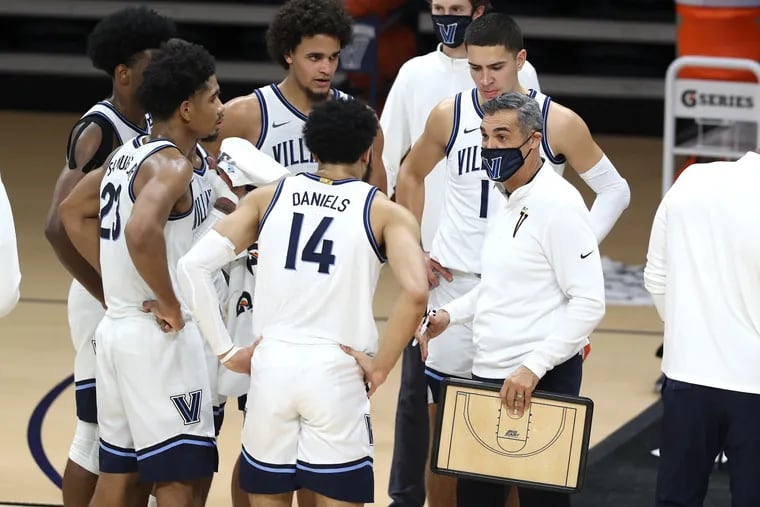 Coach Jay Wright, right, of Villanova, shown huddling with his team during the Creighton game on March 3, has received his first commitment for the freshman class of 2022 in New Jersey combination guard Mark Armstrong.