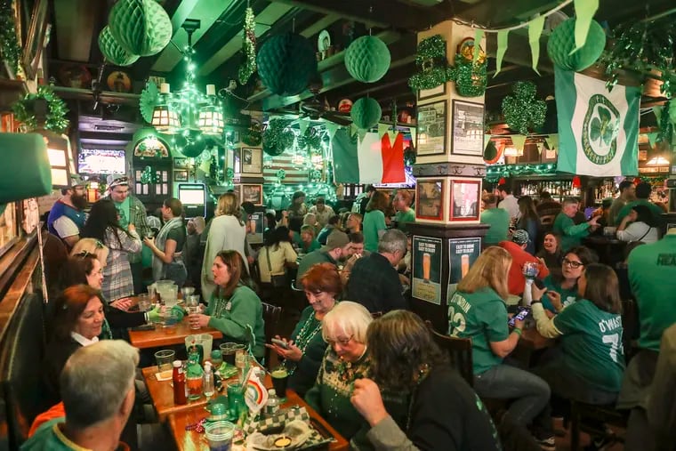 A packed McGillin's Olde Ale House in Center City on March 17, 2023. McGillin's continued its tradition of green beer and a celebration for St. Patrick’s Day.