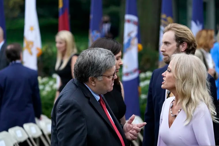 Attorney General William Barr speaks with Kellyanne Conway after President Donald Trump announced Judge Amy Coney Barrett as his nominee to the Supreme Court, in the Rose Garden at the White House, Saturday, Sept. 26, 2020, in Washington.
