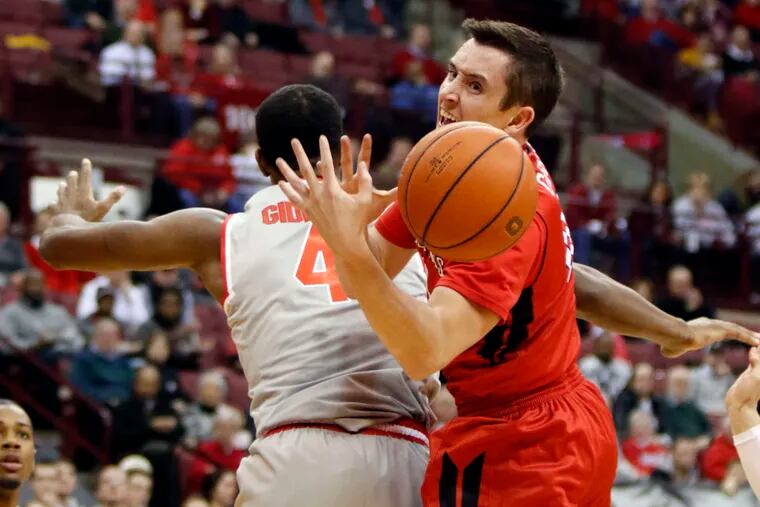 Rutgers' Justin Goode loses the ball against Ohio State's Daniel Giddens. Rutgers has lost 20 straight in the Big Ten.