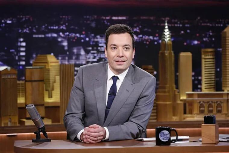 In this photo provided by NBC, Jimmy Fallon appears during his "The Tonight Show" debut on Monday, Feb. 17, 2014, in New York. Fallon departed from the network's "Late Night" on Feb. 7, 2014, after five years as host, and is now the host of "The Tonight Show,"replacing Jay Leno after 22 years. (AP Photo/NBC, Lloyd Bishop)