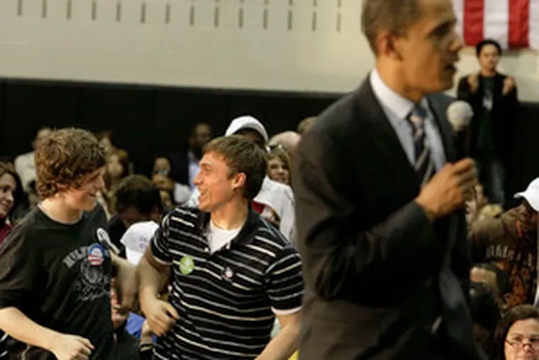 At Truman High in Levittown, Kyle Esposito, 14 (left), and Zach Carper, 17, were among those who heard Obama at a town hall. Slide shows and more online at http:// go.philly.com/paprimary