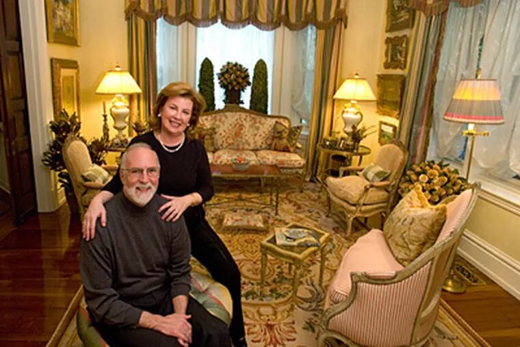 Casey and Jane Brandt in the parlor (living room) of their immense Victorian home in Moorestown. ( Clem Murray / Staff Photographer )
