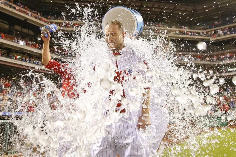 Phillies utility player Ty Kelly celebrates his walk-off single.