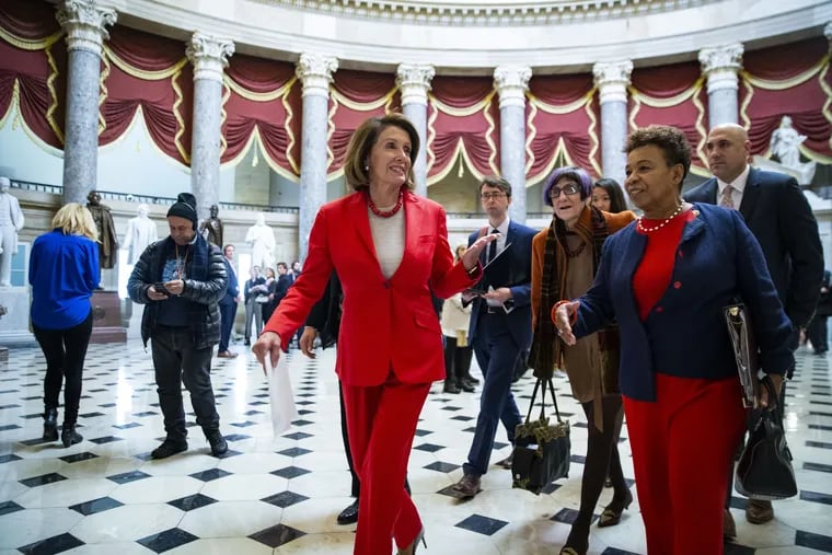 House Speaker Nancy Pelosi, a Democrat from California, center, has asked President Trump to make his upcoming State of the Union speech from the Oval Office due to security concerns. Republicans say it's a bogus claim.