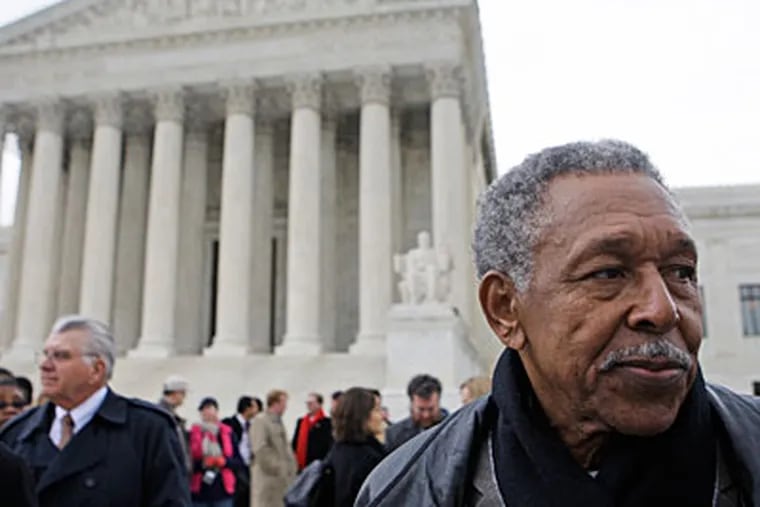 Otis McDonald, one of four plaintiffs in the Chicago handgun ban takes part in a news conference in front of the Supreme Court in March. (AP Photo/Haraz N. Ghanbari)