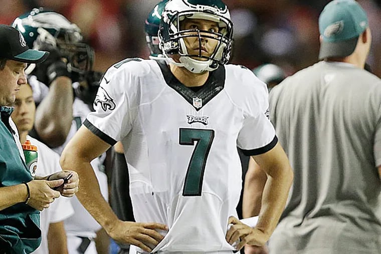 Philadelphia Eagles quarterback Sam Bradford (7) stands on the sidelines during the first half of an NFL football game against the Atlanta Falcons, Monday, Sept. 14, 2015, in Atlanta.