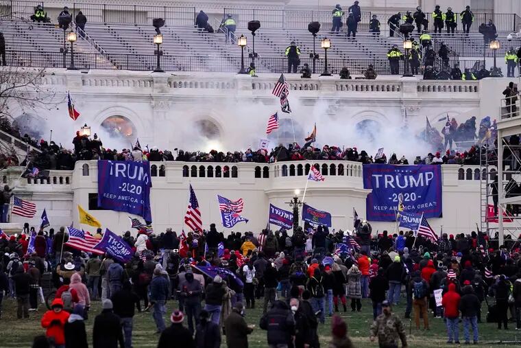 Violent rioters, loyal to then-President Donald Trump, storming the Capitol in Washington on Jan. 6, 2021.