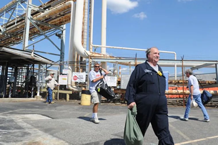 Shift change at 4 pm July 2, 2012 at the old Conoco oil refinery in Trainer which is back up and running under the auspices of Monroe Energy, a subsidiary of Delta Airlines, which will use the plant to make fuel for its airlines.  Stephen Kokas (foreground), 60, a 36-year-emloyee at this refinery (under multiple owners) was one of the workers called back to work when the plant opened.  ( CLEM MURRAY / Staff Photographer )