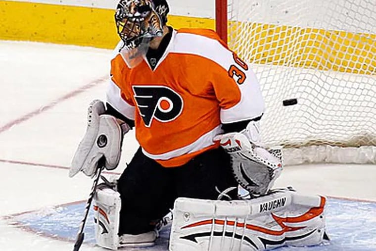 Despite his high salary, Ilya Bryzgalov has struggled to keep the puck out of the net. (Yong Kim/Staff file photo)