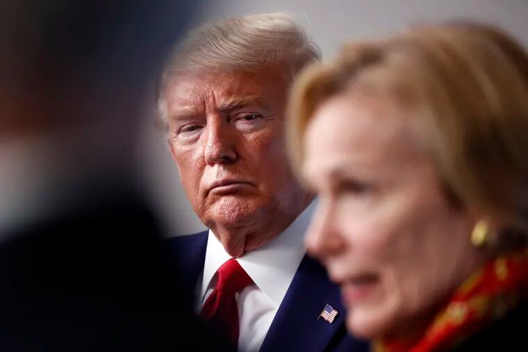 President Donald Trump listens as Dr. Deborah Birx, White House coronavirus response coordinator, speaks in March. The Trump administration has ordered that hospitals bypass the premier federal public health agency when submitting COVID-19 data.  (AP Photo/Alex Brandon, File)
