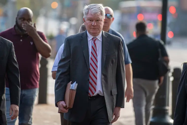 Labor leader John Dougherty arrives at the federal courthouse in Center City on Friday for the his bribery trial.