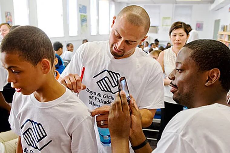 Shane Victorino visited the Nicetown Boys and Girls Club on Monday. (Clem Murray/Staff Photographer)
