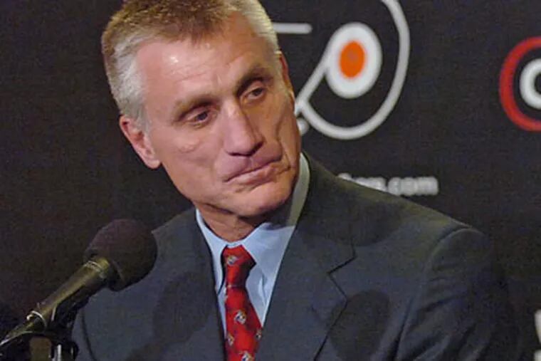 &quot;I'd like to evaluate things under the new coach for a while and see how things go with the guys coming back,&quot; Flyers general manager Paul Holmgren said. (Clem Murray/Staff file photo)