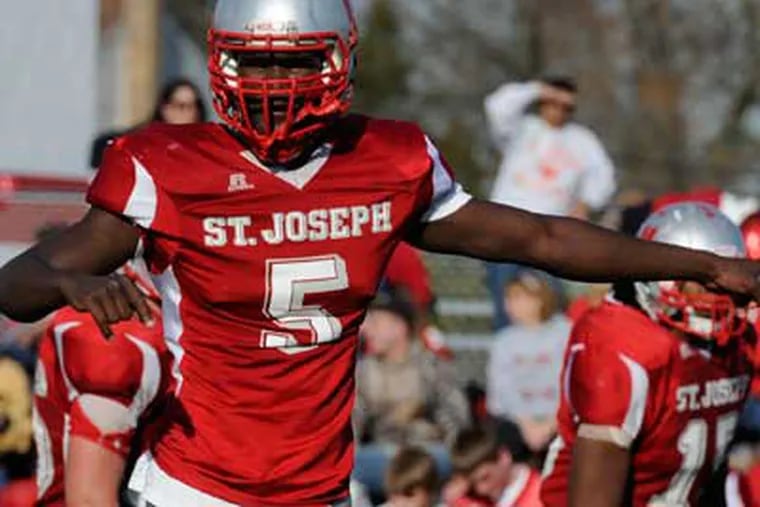 Max Valles of St. Joe's was voted The Inquirer's Defensive Player of the Year.  (Ron Tarver/ Staff Photographer)