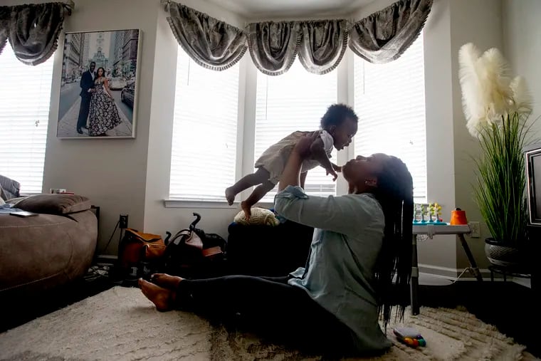 Lakeisha Faulkner Jenkins holds her 9-month-old son Kairo Ahmaad Jenkins on June18, 2022 in their Drexel Hill home.
