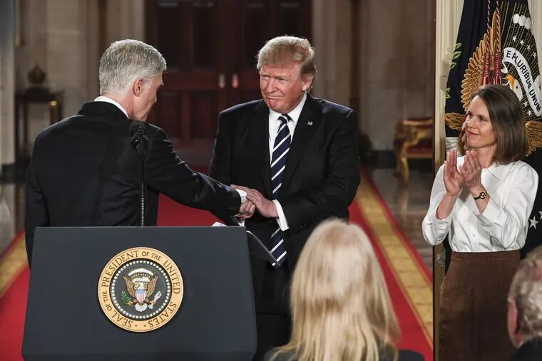 President Trump welcomes Neil Gorsuch during the announcement of his nomination to the Supreme Court on Jan. 31.