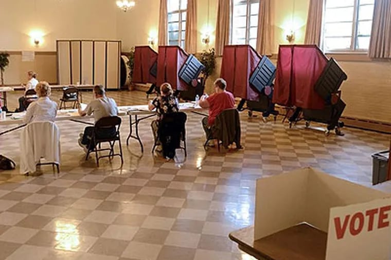The election day staff have the room to themselves, inside the 1st and 2nd District polling place in the Oaklyn Fire Department on Clinton Ave during the New Jersey primary election on Tuesday.  (Tom Gralish / Staff Photographer )