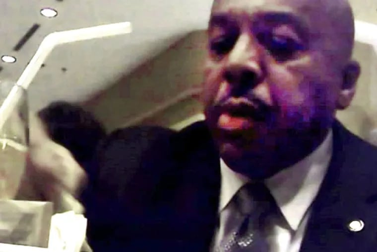 Then-State Rep. Ron Waters during a meeting in which he took cash from an informant.