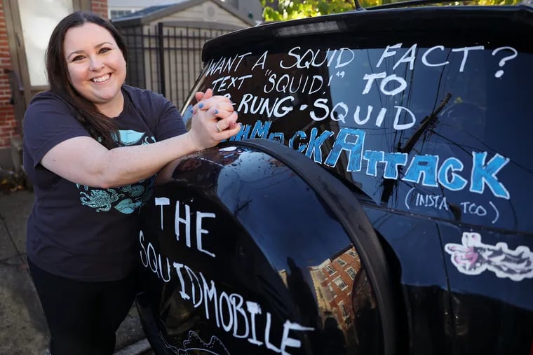 Squid biologist Sarah McAnulty with her Squidmobile in Fishtown.