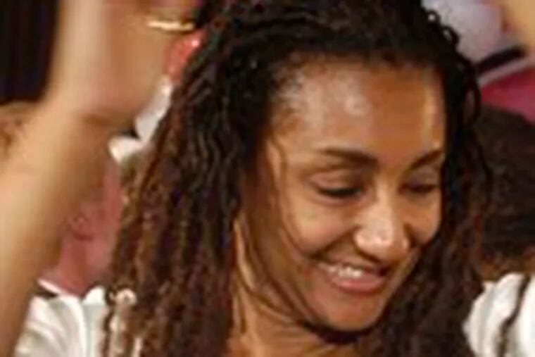 The dreadlocked hair &quot;suits my personality. Not in a militant sense, but I&#0039;m just confident in who I am,&quot; says Lisa Nutter, dancing at husband Michael&#0039;s victory party after the Philadelphia mayoral primary. The style reflects a family that is happy to defy expectations.