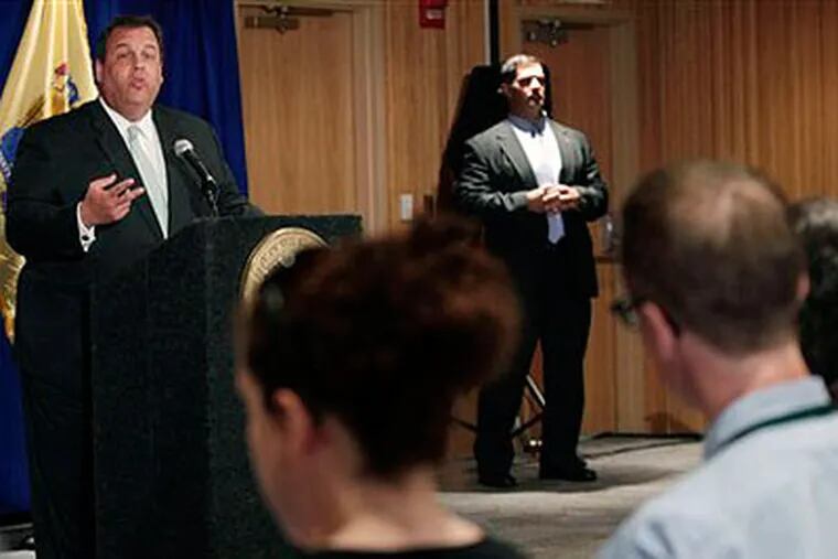 Gov. Chris Christie answers a question Thursday, June 2, 2011, in Denville, N.J., as he says he used a state police helicopter for two personal trips, including to fly to his son's baseball game. Christie and the State Republican Committee are reimbursing the state for the governor's personal use of the helicopter. (AP Photo / Mel Evans)