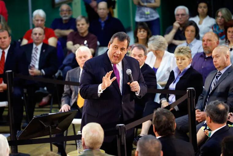 Gov. Christie leads a town-hall meeting in Sparta, N.J. The governor, who has been spending time on the road as he considers a possible run for president next year, went toe-to-toe with a retired teacher over the state’s pension fund troubles. (JULIO CORTEZ / Associated Press)