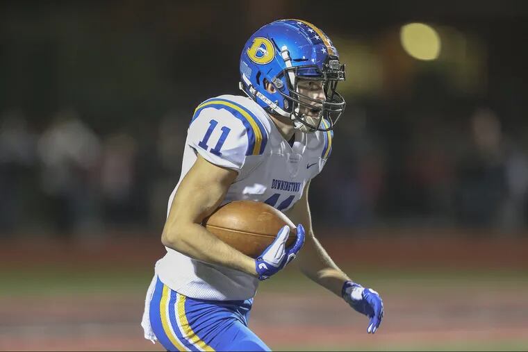 Downingtown West's Dan Byrnes returns a kickoff against Coatesville during the 1st quarter in Coatesville, Pa., Friday October 5, 2018.