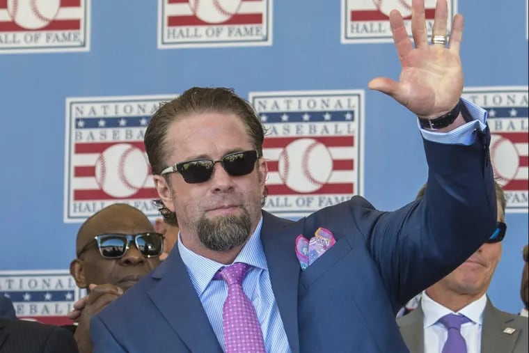New Hall of Famer Jeff Bagwell waves to the  Astros fans who made the trip to Cooperstown.