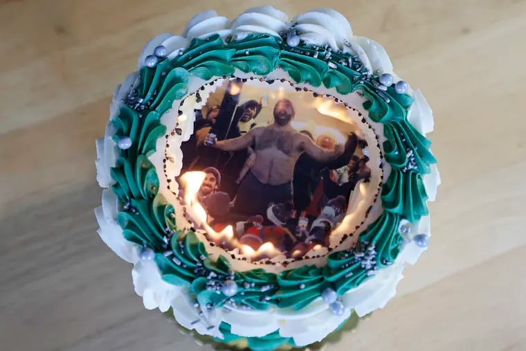 "There is only one Kelce I'm watching the Super Bowl for," is burned away to reveal a photo of a shirtless Jason Kelce celebrating his brother Travis' touchdown at the recent playoff game in Buffalo. The cake is made by Kaylyn Kahana, owner of Kay Kay's Bakery in South Philadelphia.